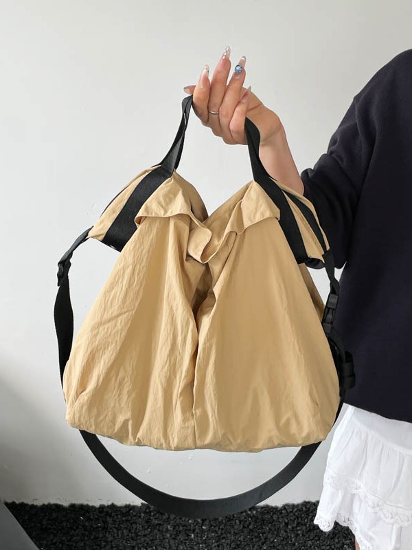 2026 nuevo bolso de nylon coreano ligero de gran capacidad bolso de tela de viaje casual versátil bolso de hombro resistente al desgaste mujer