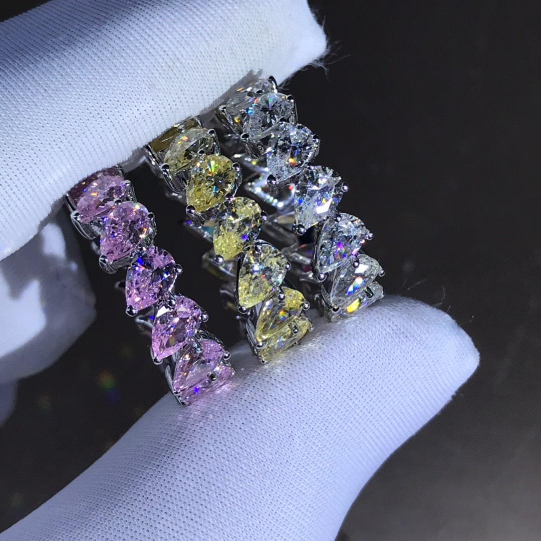 Gran marca mismo estilo gota de agua color diamante fila diamante anillo 30 puntos VVS nivel 3EX corte con incrustaciones importado anillo de diamantes de alto carbono