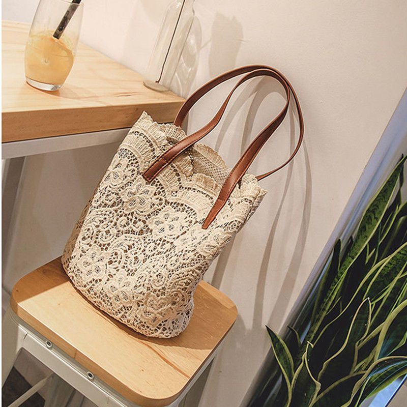 2025 spring and summer factory new straw bag lace bucket mother hollow beach bag foreign trade cross-border explosions women's bag