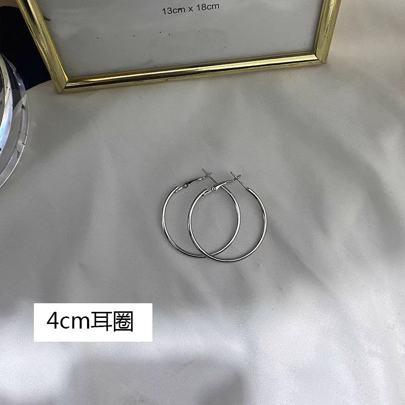 Pendientes al por mayor transfronterizos puestos del mercado nocturno Pendientes de origen empresarial Pendientes de borla de temperamento de todo fósforo público Pendientes coreanos