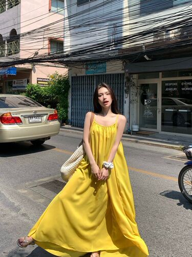 Beach vacation sexy backless suspender dress for women's summer new loose a-line dress gentle yellow long dress