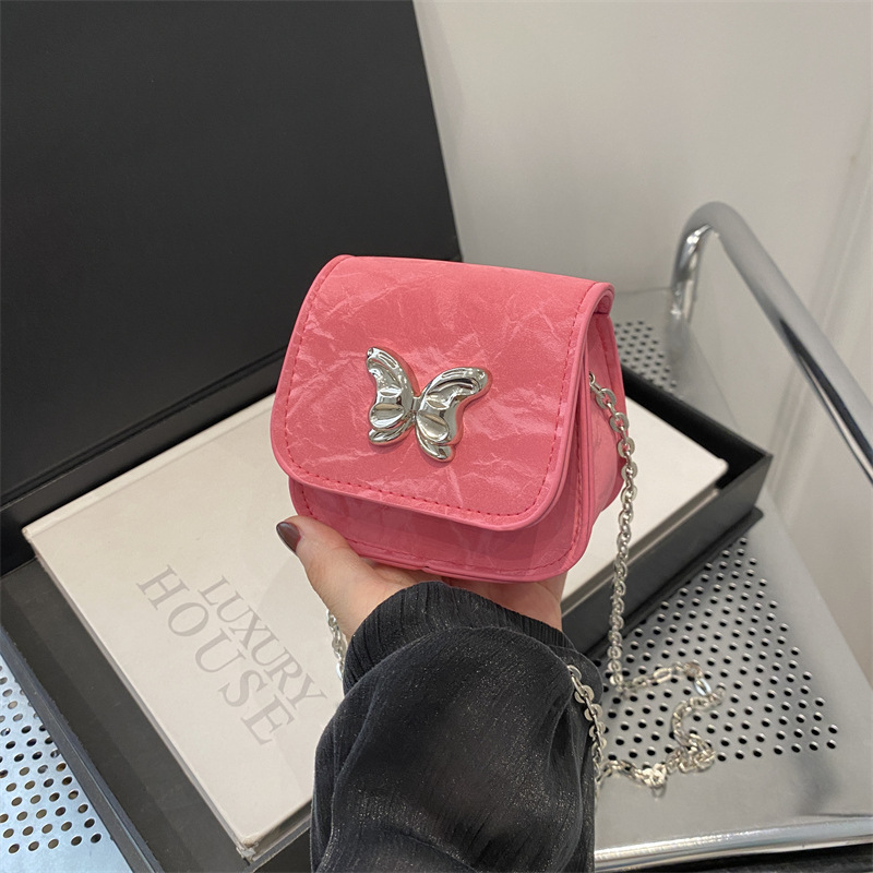 Mariposa de personalidad estética francesa 2024 otoño nuevo color sólido casual moda cadena mensajero hombro pequeño bolso cuadrado mujer
