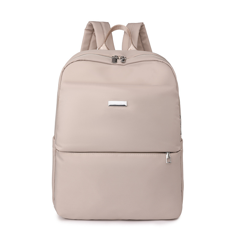 2023 invierno nuevo estilo casual damas mochila de nailon simple y versátil mochila de viaje de negocios de gran capacidad al por mayor