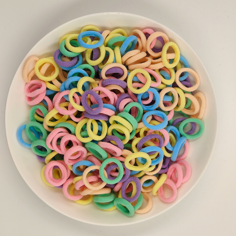 Color de caramelo de alta elasticidad pequeña toalla anillo de cabello bebé anillo de cabello no daña cabello atado fábrica de cabello al por mayor