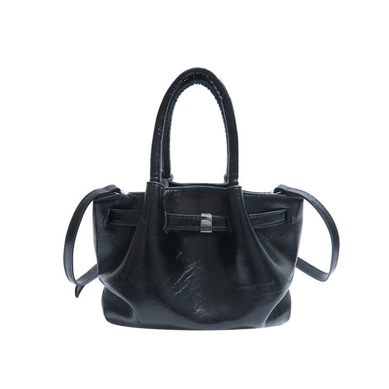 Nicho de diseño de moda bolsas de balde para mujeres 2025, nueva moda bolsas de hombro de estilo extranjero, bolsas de mano de alto nivel.