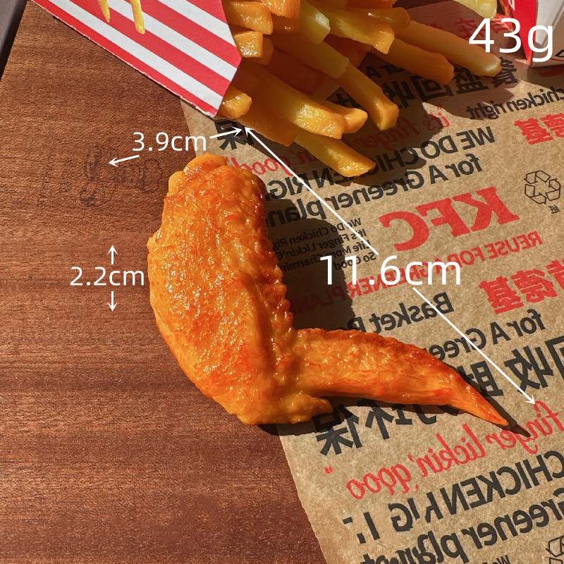 Venta al por mayor de fábrica de modelos de comida realistas: papas fritas, muslos de pollo, alas, garras de cangrejo estilo Orleans, modelos de comida frita, accesorios realistas de alta calidad.