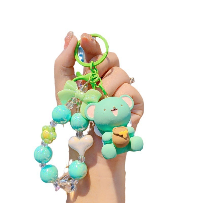 Creativo lindos cuentas miel osos coches mochilas de automóviles para hombres y mujeres parejas pequeños regalos colgantes de llaveras al por mayor