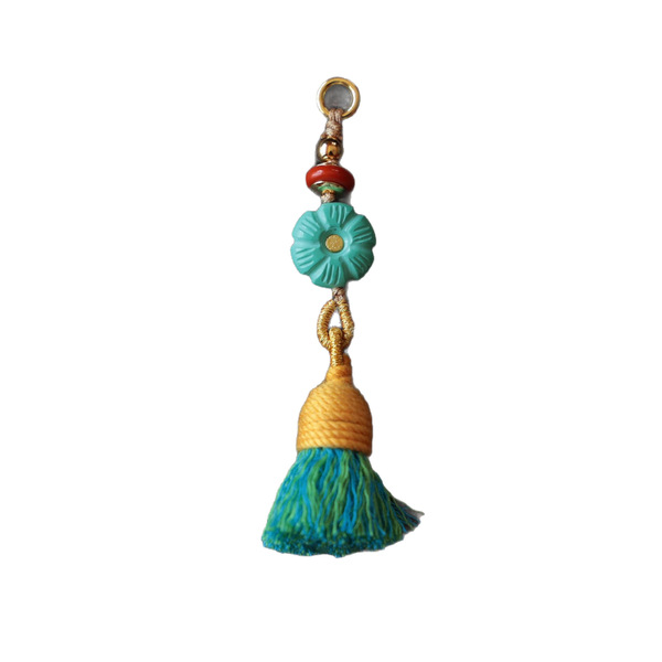 Genuine design pendant with tassels
