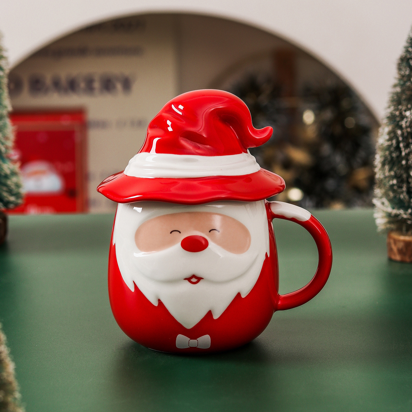 A Santa Claus cup + lid (red)