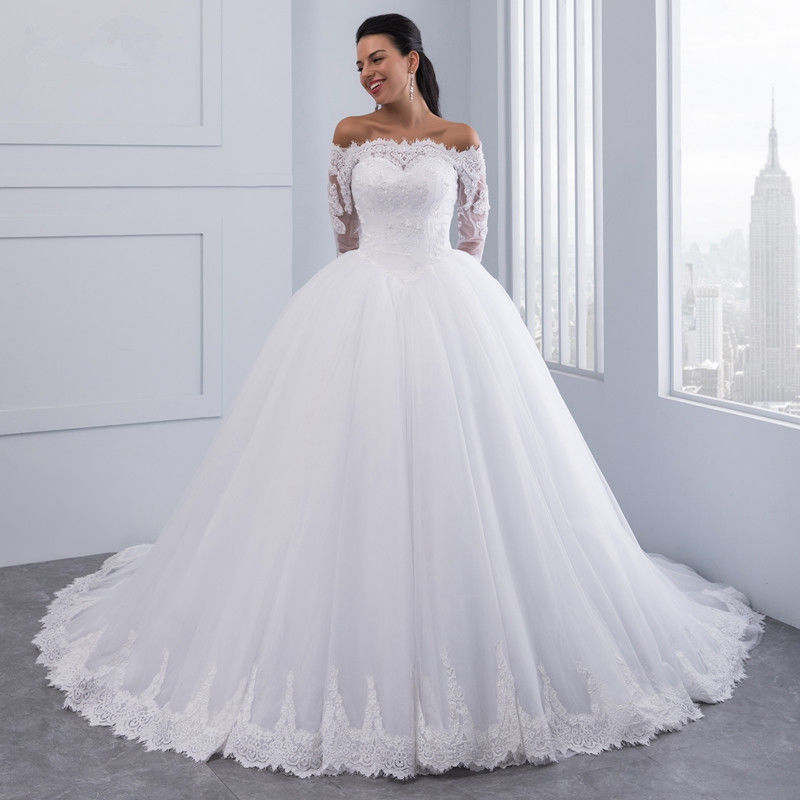 Vestidos de novia europeos y americanos 2026, nuevo estilo, con hombros descubiertos, manga larga, diseño ceñido a la cintura, encaje elegante y adelgazante con cola larga.