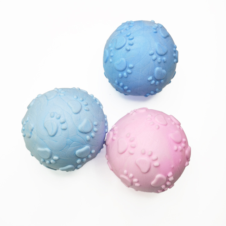 Transfronterizo juguete para mascotas huellas de espuma TPR bola mordedura molar sabor a leche bola sólida fábrica de juguetes para perros