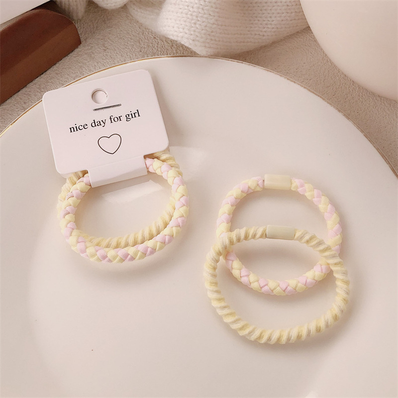 A principios de la primavera nueva cuerda de cabeza de color caramelo anillo de cabello coreano de niña de alta elasticidad universal cola de caballo cuerda de cabello adornamiento para el cabello