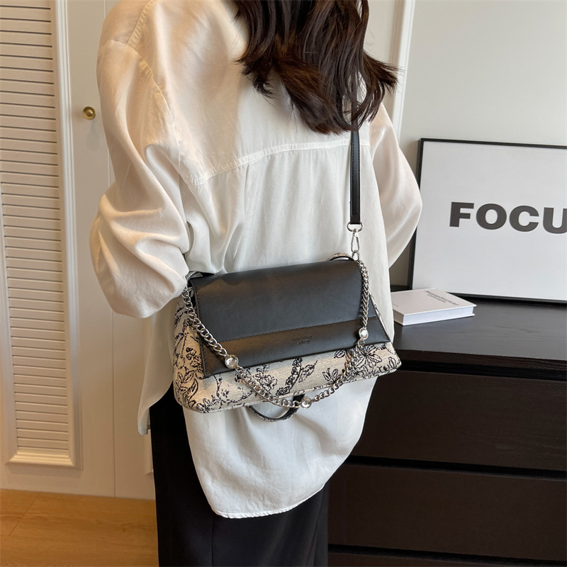 Diseño coreano de nicho simple bolso de hombro de color contraste para mujeres verano 2026 nuevo estilo diario bordado bolso de viaje al trabajo