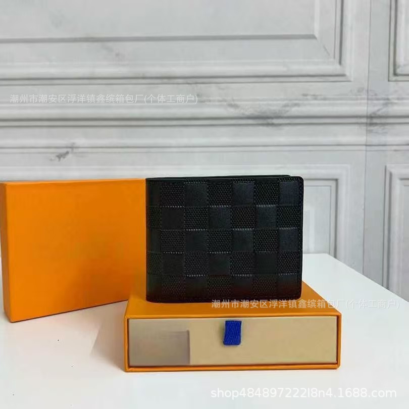 Cartera de moda de hombre transfronteriza europea y americana corta billetera de cuero real plegable para mujeres embalaje de cartera de suministro de comercio exterior Q217