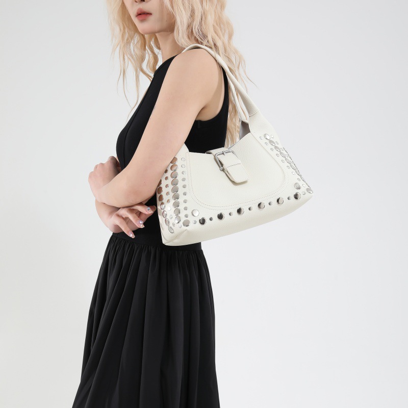 Bolso de axila con textura transfronteriza 2025 primavera y verano nuevo bolso femenino bolso retro con patrón de lichi bolso de hombro con remaches personalizado