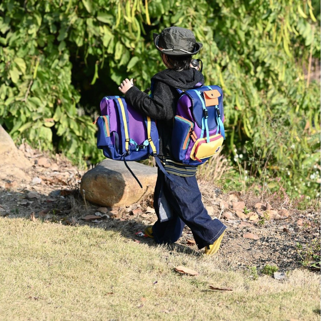 Mochila de moda de color contrastante para hombres y mujeres, mochila de gran capacidad al aire libre, mochila de viento, mochila deportiva de ocio, bolsa de montaña, moda