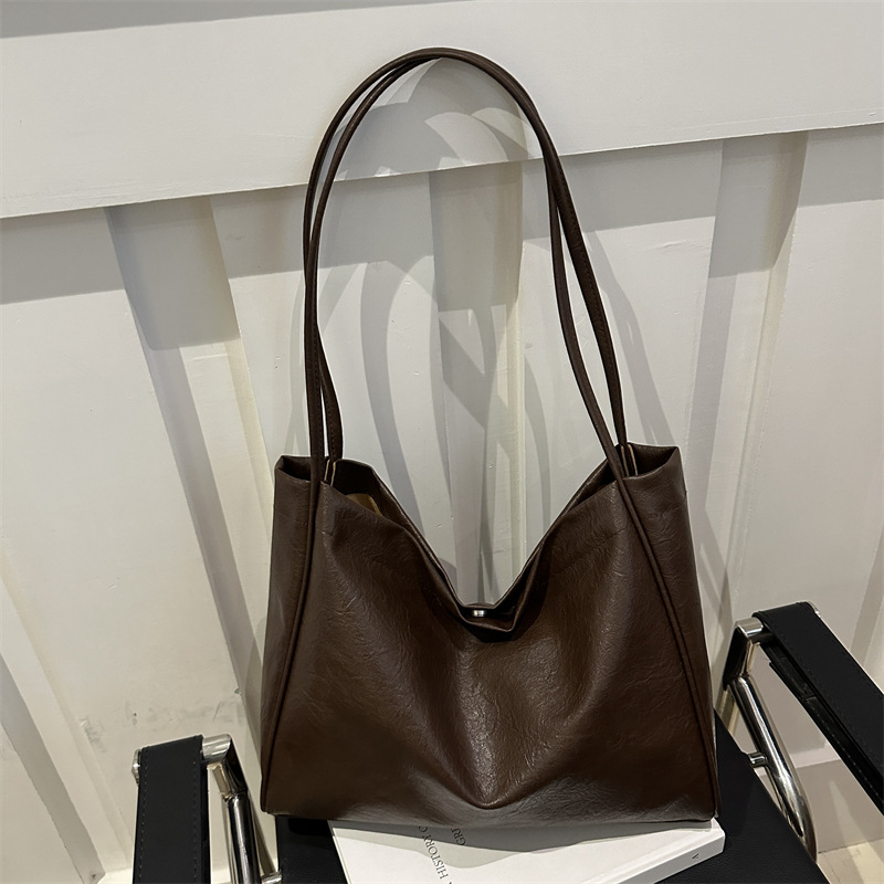 Bolsa de mano casual coreana para mujeres 2024 nueva moda de alta capacidad bolso de hombro de estilo minimalista bolso de mujer de viaje al trabajo