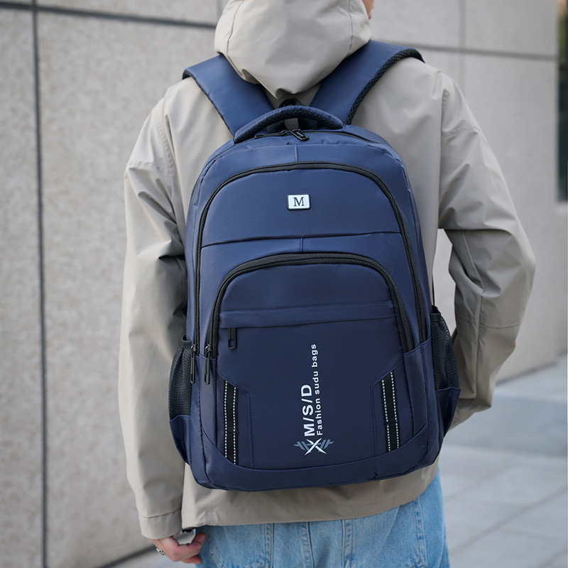 Al por mayor nueva mochila simple ocio mochila de estudiantes de primaria y secundaria de moda ligera de viaje mochila de gran capacidad