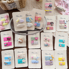 新しい刺繍レースの模様のキノコの漫画の韓国系の子供の蝶結びのヘアピンのかわいい赤ちゃんの髪の飾り
