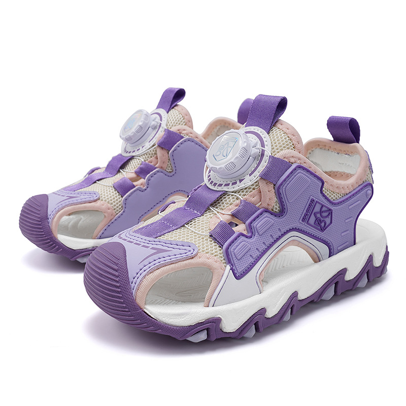 Sandalias Baotou para niñas 2025 nuevo botón giratorio para niños grandes zapatos de playa para niños antideslizantes de suela suave y resistentes al desgaste