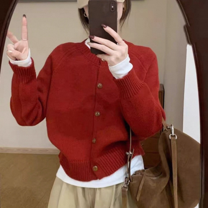 Corea del Sur 2025 otoño y invierno nuevo estilo extranjero V-cuello grueso aguja floja de color sólido jersey de punto suéter