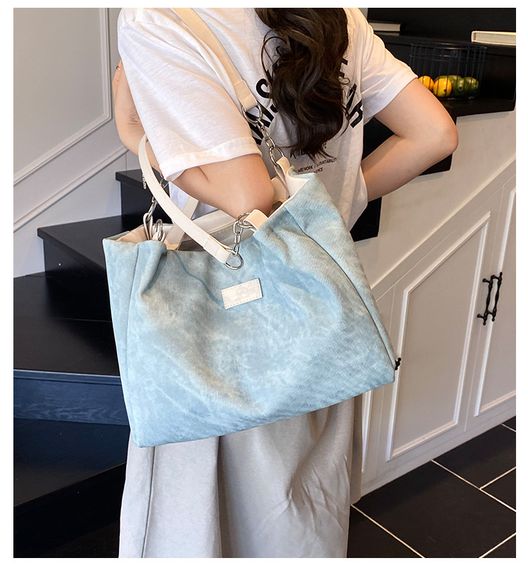 Korean style simple and versatile bag for women, new summer 2025 fashion and niche handbag, large capacity tote bag for commuting full figure