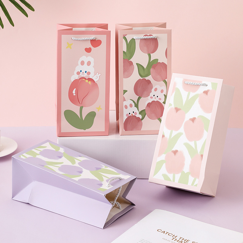 多款风格创意白卡纸水杯袋现货厂家直销酒水饮料毛巾送礼包装袋