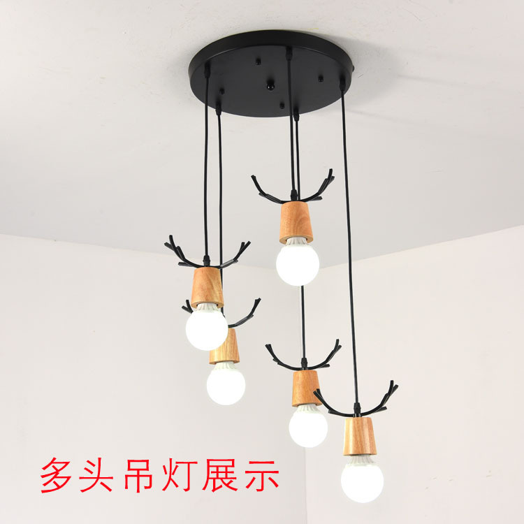 Accesorios de caja de techo de disco largo negro blanco de tres cabezas de cuatro cabezas lámpara de comedor lámpara de iluminación del hogar Placa de combinación