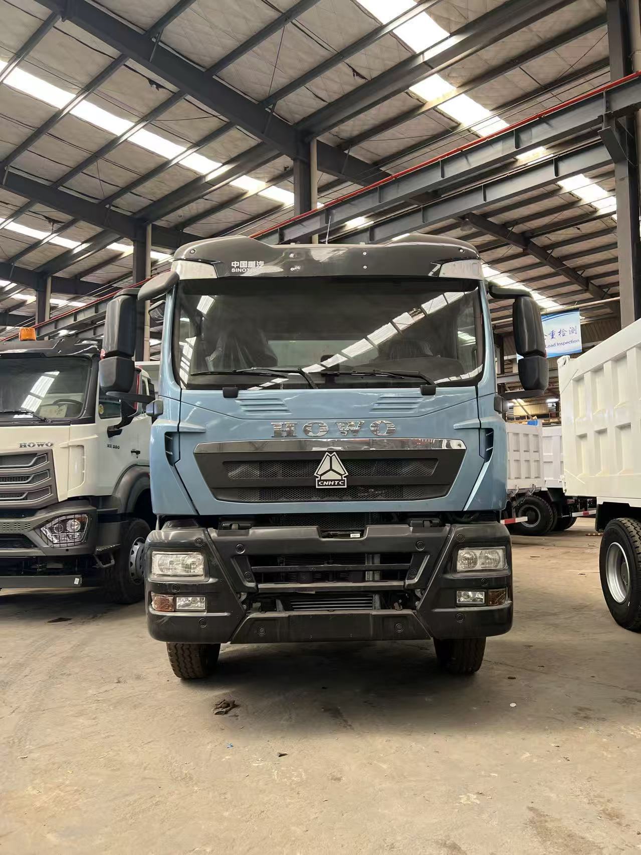China Heavy Duty Truck HOWO TX dump truck, eight-wheel dump truck, mining and gravel engineering transport vehicle, exported to Africa