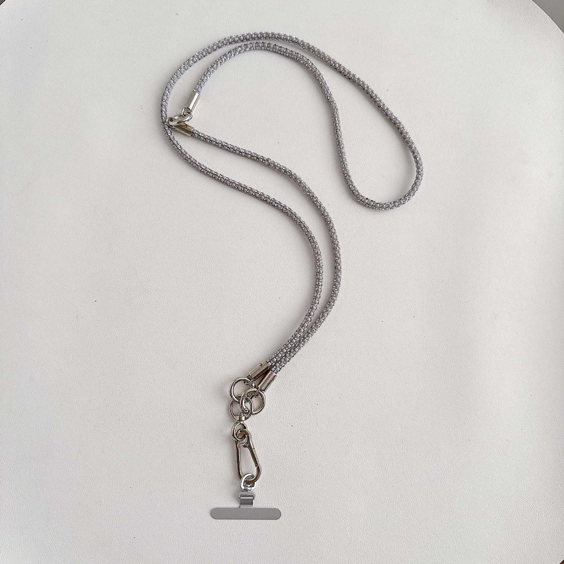 Cadena de teléfono móvil de alta gama hecha a mano de boutique, cordón de teléfono móvil de moda tres en uno de diamantes de lujo, mensajero largo/colgante