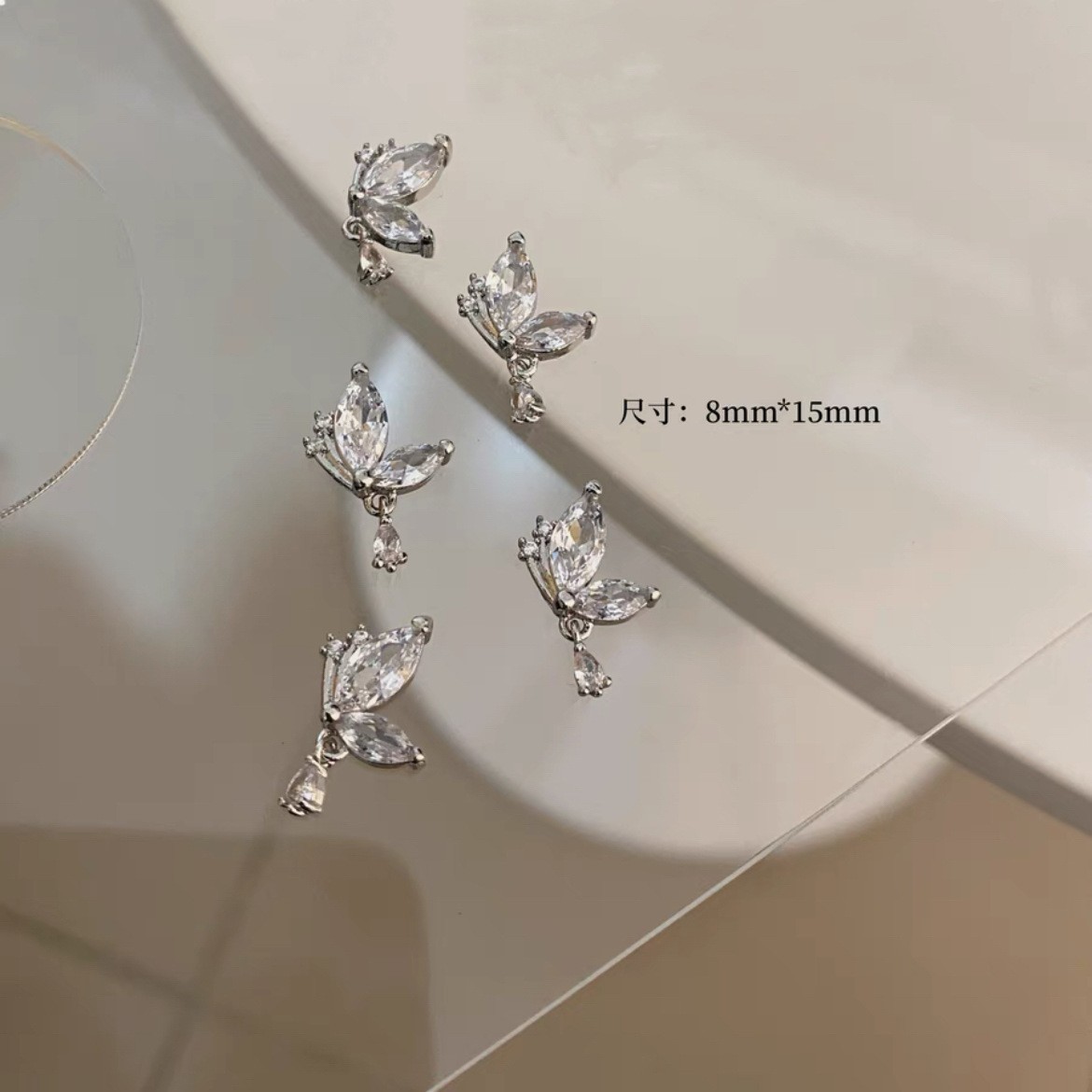 Celebridad de Internet nuevos accesorios de uñas Iris arco de alta retención de color ajuste arco de uñas diamante desgaste material de uñas diamante