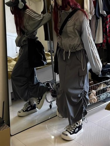 American street-style high-waisted workwear drawstring A-line back-split long skirt with large pockets for women, suitable for spring and summer.