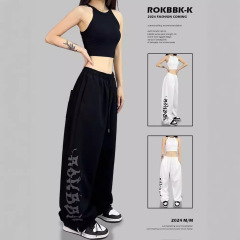 街のレトロなヒップホップの広い足のゆったりしたスポーツズボンの女性の春と秋のジャズのヒップホップのダンスのカジュアルなズボン