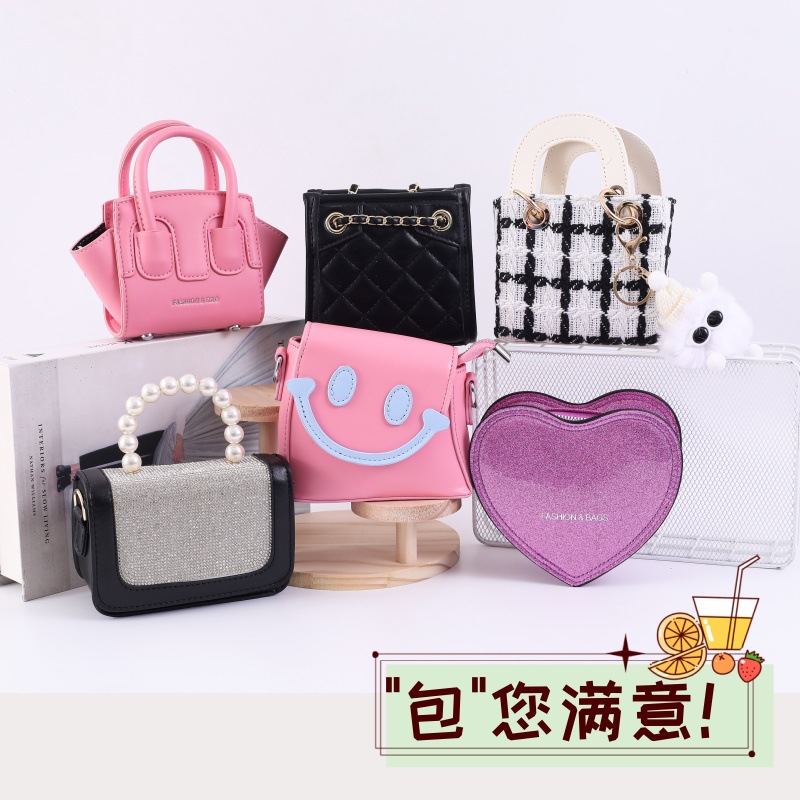 2025 primavera y verano estilo caliente moda casual niños dulces bolsa de gelatina mini bolso de mensajero de un solo hombro variedad al por mayor