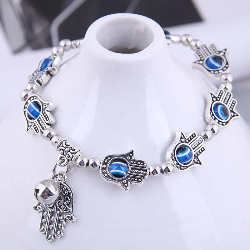 AliExpress Hot Selling Retro Hand of Fatima Bell Pendant Alloy Bracelet Devil's Eye Lucky Tassel Jewelry