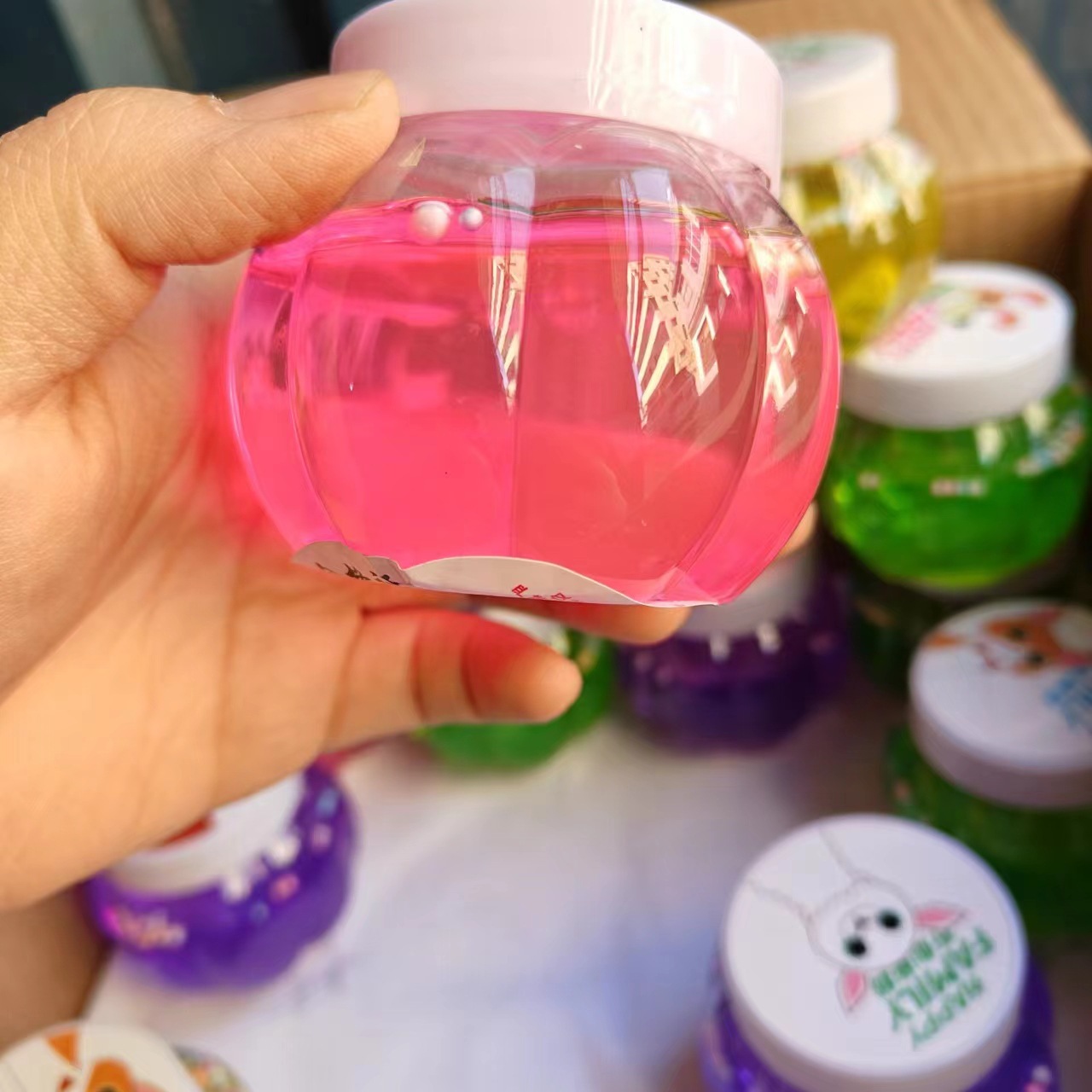 calabaza de lodo de cristal fabricantes de goma espumante botella de alta permeabilidad al por mayor Slime estand hecho a mano 2 yuanes grandes almacenes al por mayor