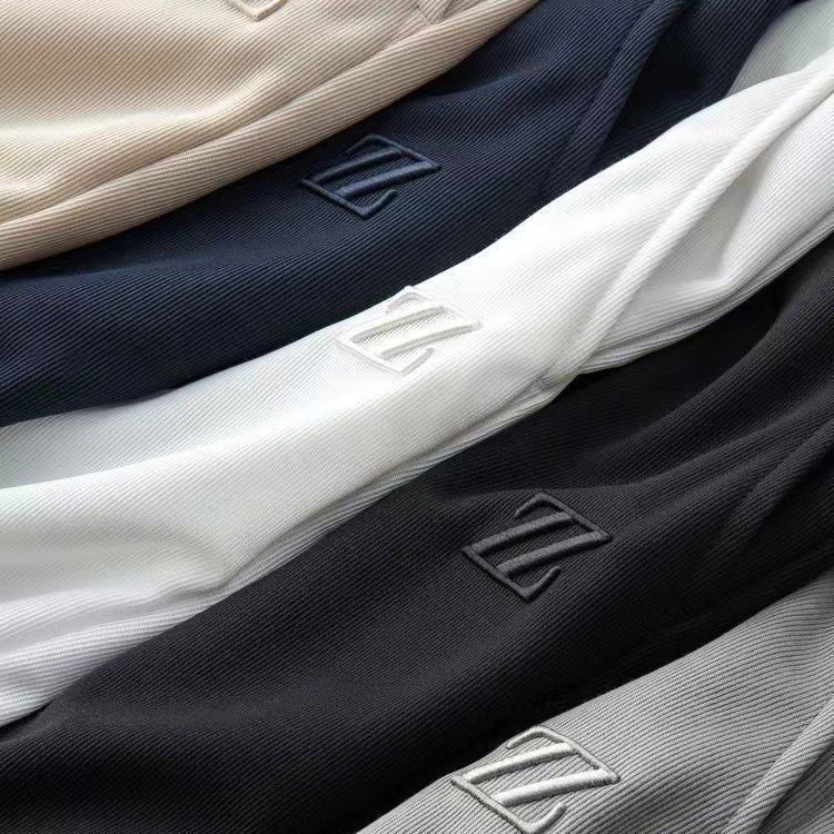 Herrenbekleidung Freizeithosen für Männer dünne Strickstickerei gepresster Kleber dreidimensionaler Modetrend All-Match-Sport-Slim-Fit-Jogginghose für Männer_voghion.com