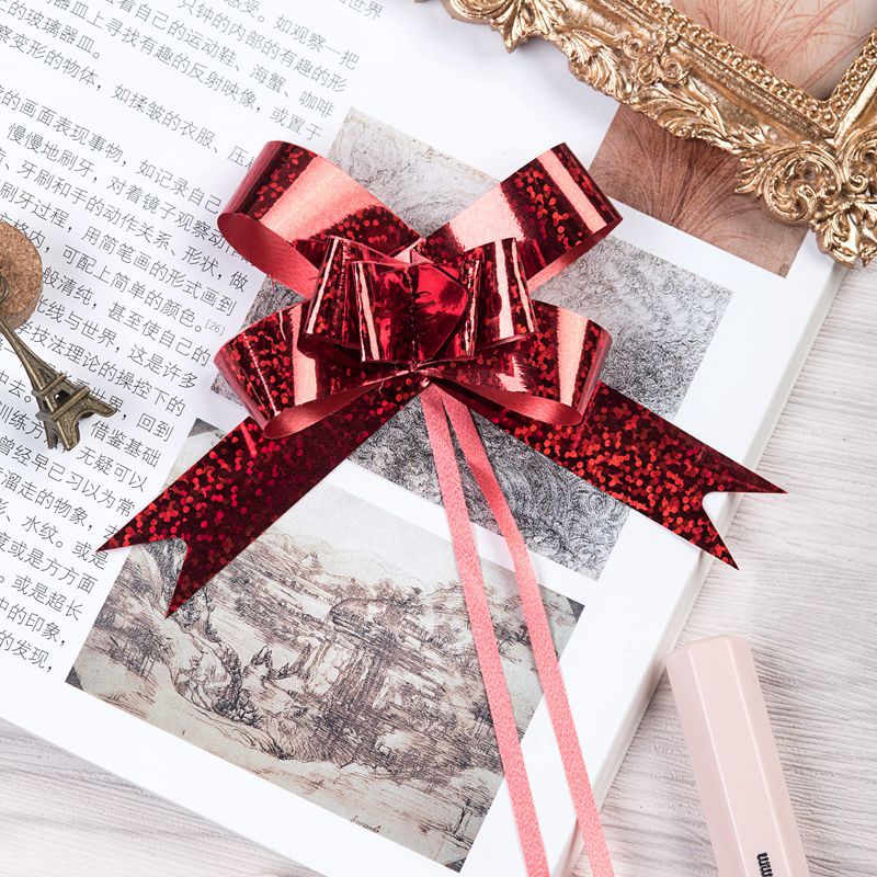 Venta caliente transfronteriza 18mm láser metálico dibujado a mano flor regalo de Navidad embalaje dibujo flor arco tirar flor envío gratuito