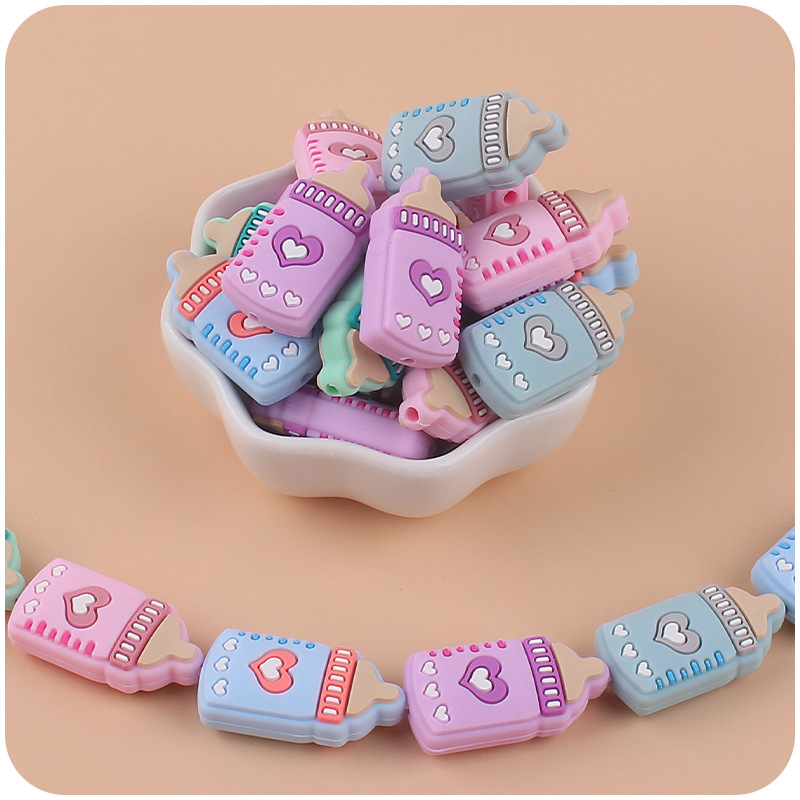 Bebé suministros de dibujos animados de silicona biberón pequeño mordedor creativo DIY bebé molar cadena pezón cadena anti-caída Accesorios