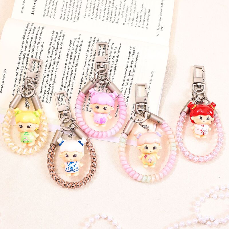 Round-headed Chinese-style girl phone cord creative cartoon mobile phone pendant spring cord bag keychain anti-loss