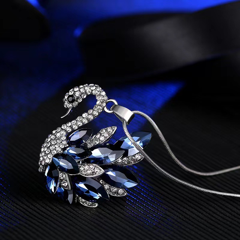 Simple elegante nuevo Cisne cristal estilo coreano suéter largo cadena collar de las mujeres Otoño e Invierno versátil borla accesorios moda