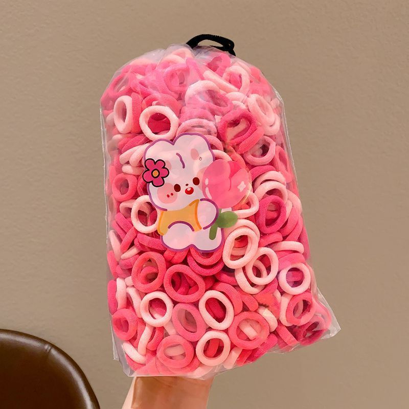 Bandas de goma de color caramelo para niños anillo de toalla bebé no lastimar el cabello elástico buena banda de goma para niñas atadas anillo de cabello tocado