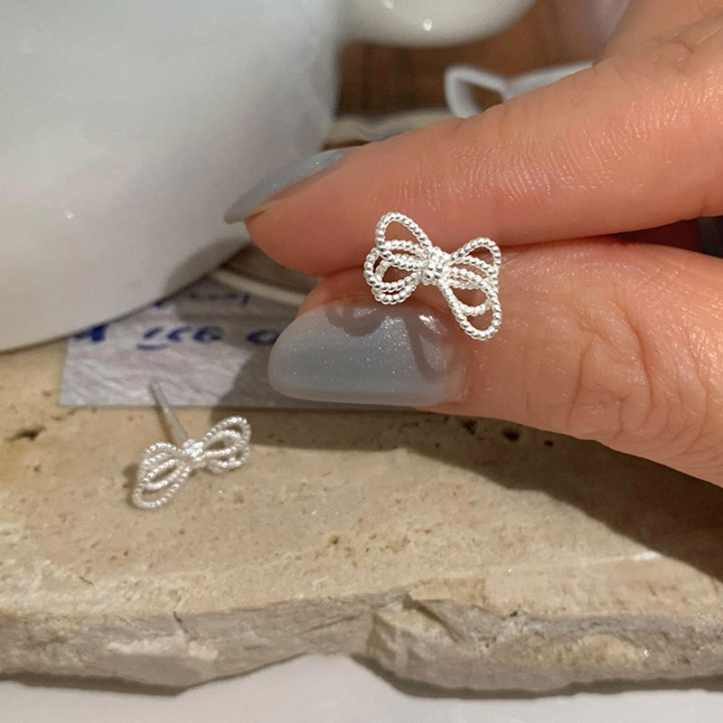 Earrings with bow, silver 925 sample