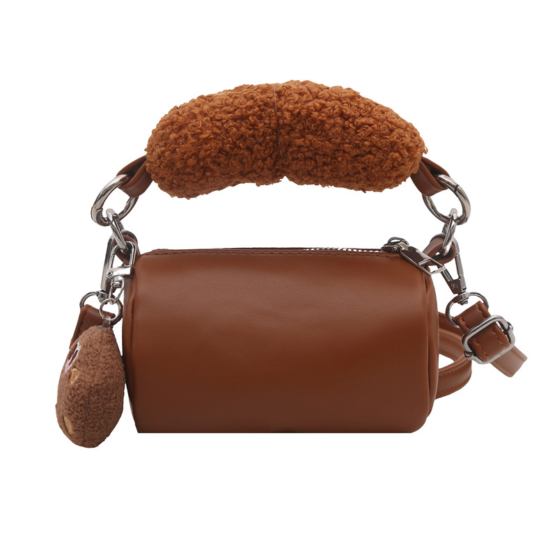 2025 otoño y invierno nuevo bolso infantil de moda coreana mini niñas bolso de peluche lindo colgante bolso cilíndrico