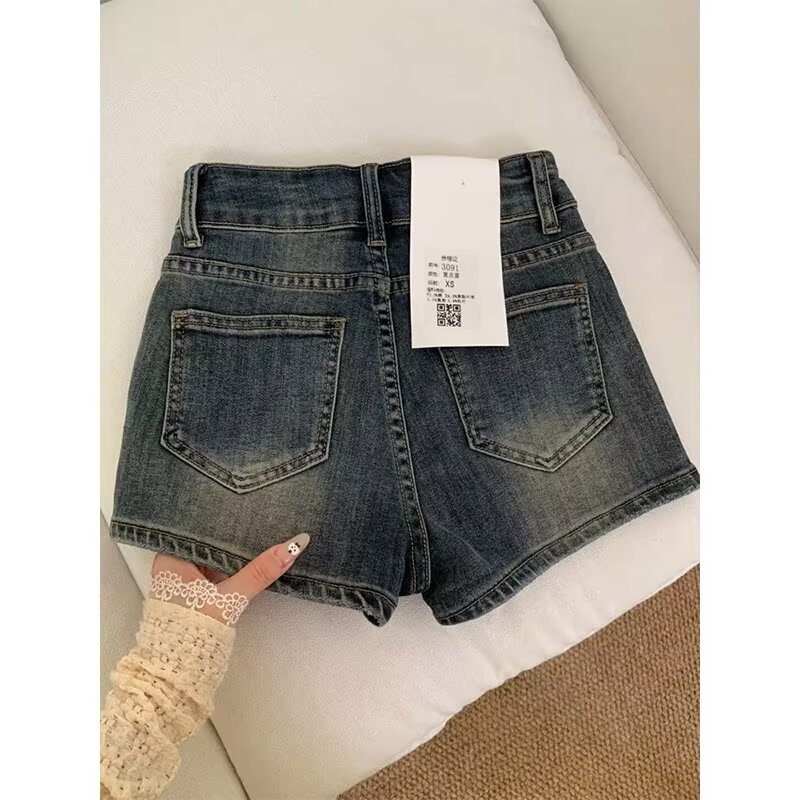 アメリカンレトロなダメージ加工ヒップカバーデニムショートパンツ女性用夏の新しい多用途ハイウエスト2ボタンスリムホットガールホットパンツ|undefined