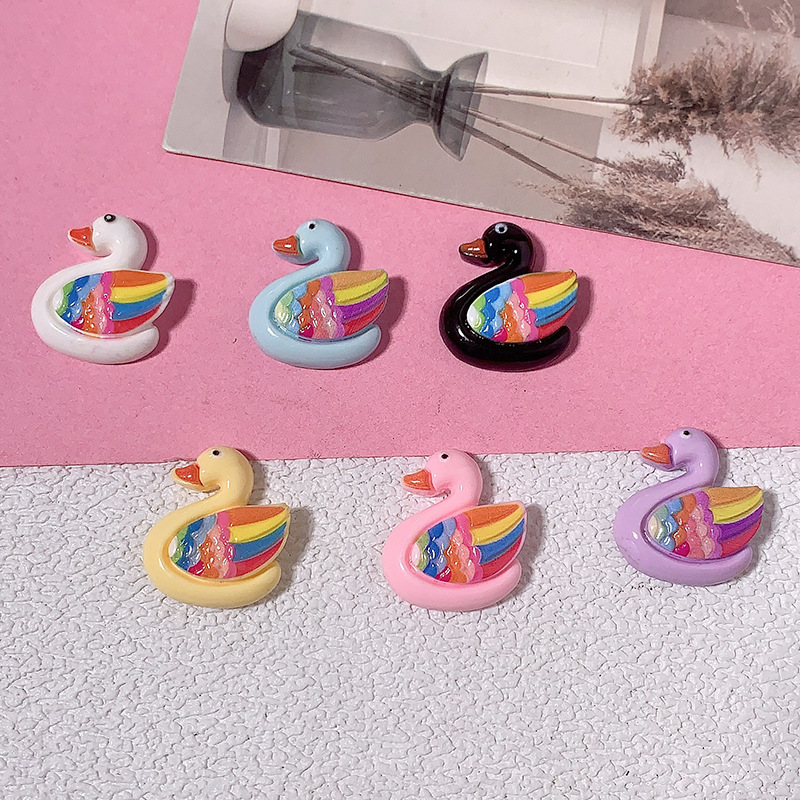 Nuevo colorido cisne diy accesorios de resina crema pegamento para el cabello clips para el cabello teléfono móvil agujero agujero hebilla hecha a mano al por mayor