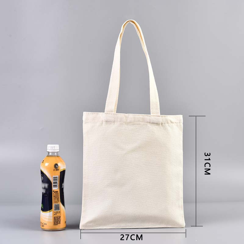 En stock bolsa de lona portátil en blanco personalizable logotipo de impresión en color de un solo hombro bolsa de compras bolsa de algodón de entrenamiento publicitario