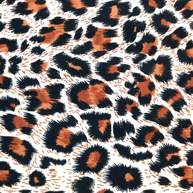 Inventario de alta calidad impresión de leopardo amarillo negro 100 algodón tela de ropa de seda