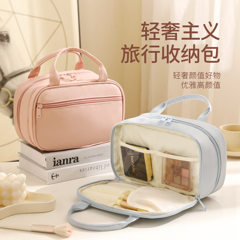 Nueva bolsa de maquillaje de lujo ligera de gran capacidad portátil PU bolsa de almacenamiento de dos cremalleras portátil bolsa de lavado de viaje impermeable