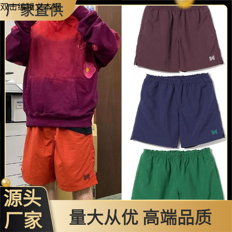 NEEDLES, a high-street fashion brand, collaborated with Tokyo to release limited-edition solid-color athletic casual shorts (five-point pants) featuring butterfly embroidery for men and women.